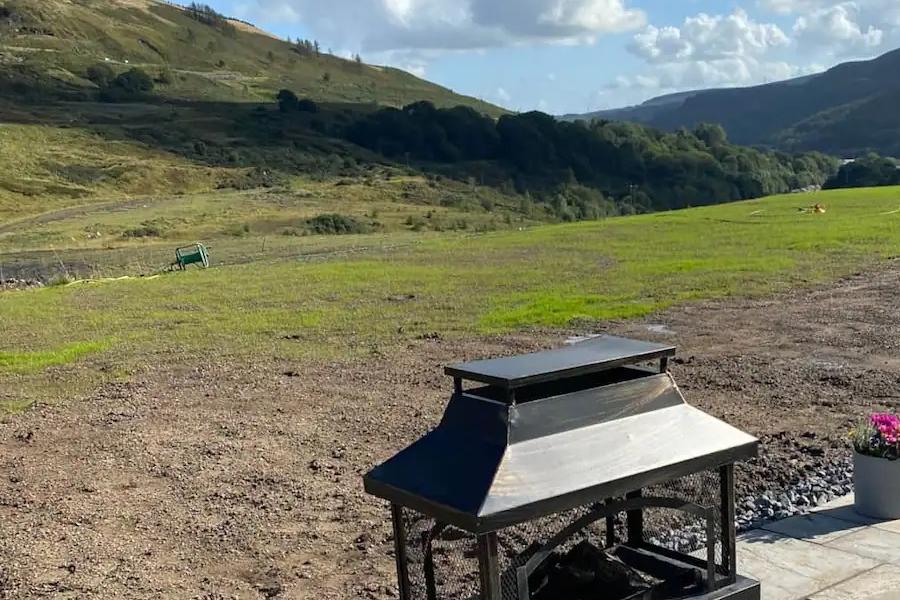 Outdoor patio and fire pit at Fernhill Valley Farm